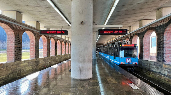 A train pulls into Laclede's Landing MetroLink Station.